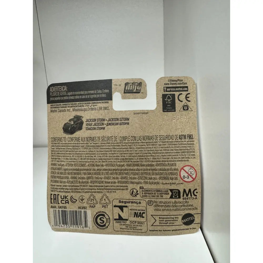 Retro della confezione cars mini jackson storm in cartone beige con testo nero bianco e informazioni di sicurezza