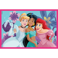 Puzzle cubi principesse disney con cenerentola jasmine e ariel su tappetino rosa con motivi floreali stilizzati