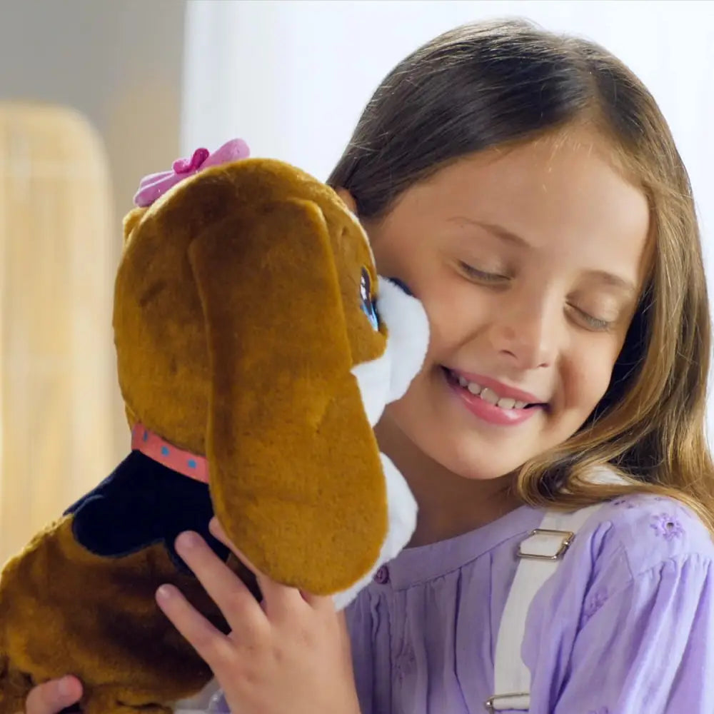 Plush brown puppy toy with blue eyes and pink bow from club petz susy canta e balla collection