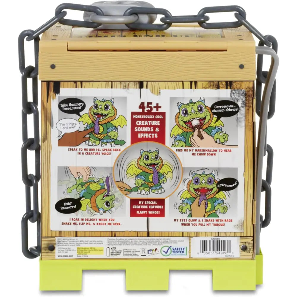 Green plastic dragon toy with wings and purple tongue in a wooden crate design from crate creatures sizzle drago interattivo