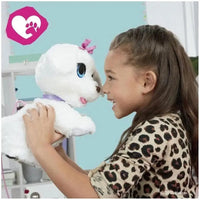 Plush white furreal gogo cagnolino ballerino puppy toy with blue eyes and pink bow on its head