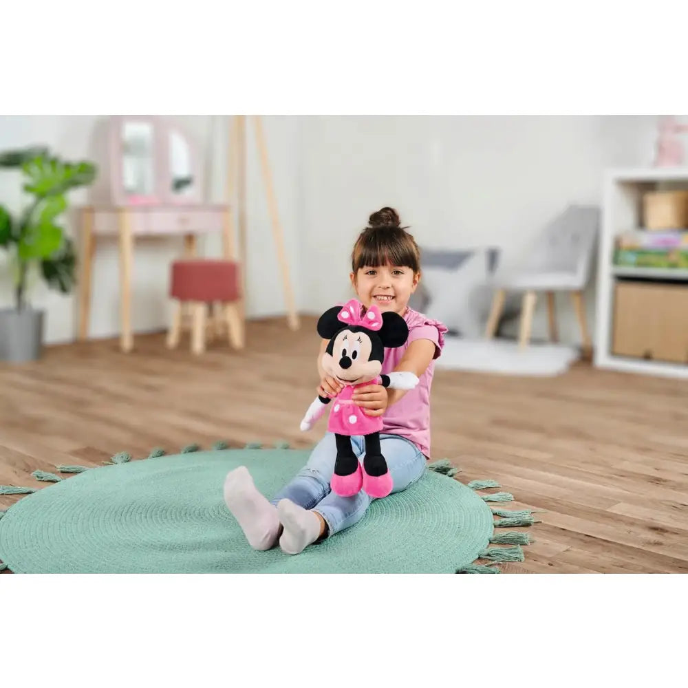 Minnie peluche 35 cm simba rosa con orecchie nere e fiocco rosa vestita con abito a pois