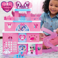 Pink plastic minnie pet hotel disney playset with blue accents and a transparent slide for kids