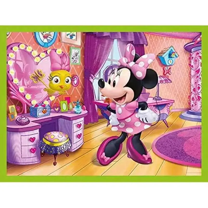 Minnie puzzle cubi con abito rosa a pois bianchi, guanti bianchi e fiocco coordinato sulla testa