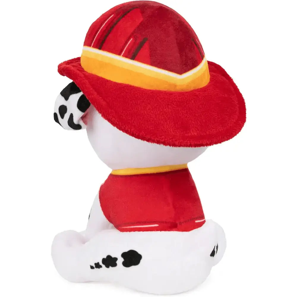 Cucciolo bianco e nero con cappello da pompiere rosso e giallo peluche paw patrol marshall
