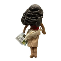 Peluche vaiana disney oceania con capelli afro castano scuro, gonna beige e maglietta rossa