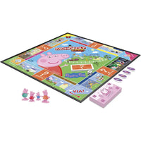 Gioco moneta monopoly junior peppa pig con plancia colorata, accessori rosa e viola e quattro personaggi in figura