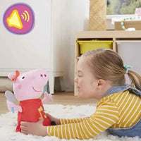 Peppa pig peluche che canta originale hasbro rosa con maglietta rossa e note musicali gialle