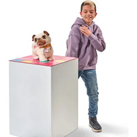 Furry pug plush toy cane carlino with brown ears and muzzle sitting on colorful tiled platform poppy cane carlino danzante