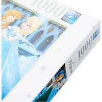 Scatola bianca contenente puzzle ravensburger 1000 pezzi frozen con elsa e anna in abiti blu ghiaccio
