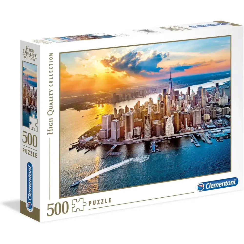 Scatola bianca di cartone per puzzle 500 pezzi new york con vista aerea al tramonto e riflessi dorati sull acqua