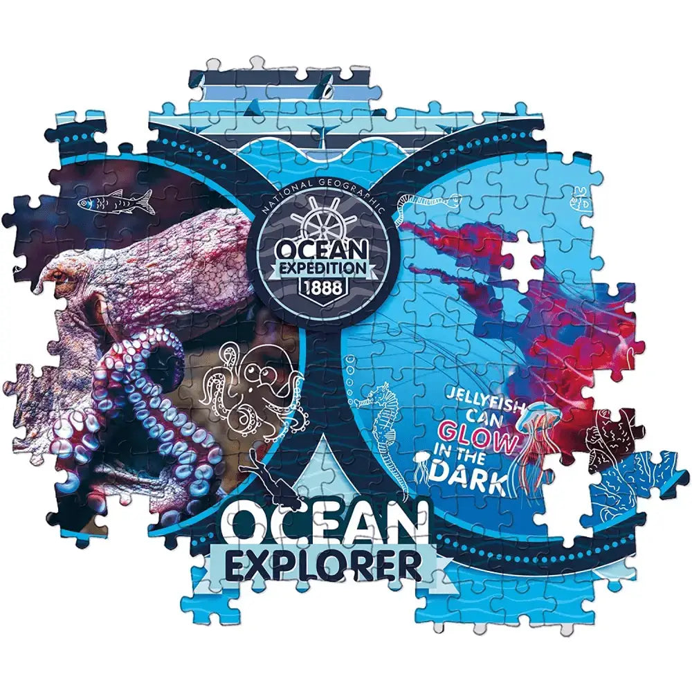 Puzzle national geographic ocean explorer con motivi di polpo meduse e navi in colori blu viola e rosso vibranti