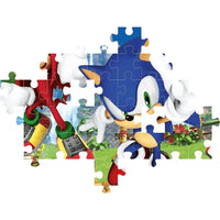 Sonic supercolor puzzle 104 pezzi con immagine dinamica di Sonic blu e bianco con occhi verdi su pezzi di cartone
