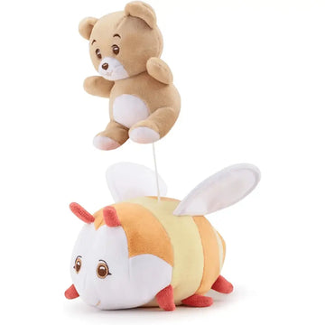 A plush teddy bear with tan fur and white accents sitting on a yellow and orange striped bee plush toy dolce melodia