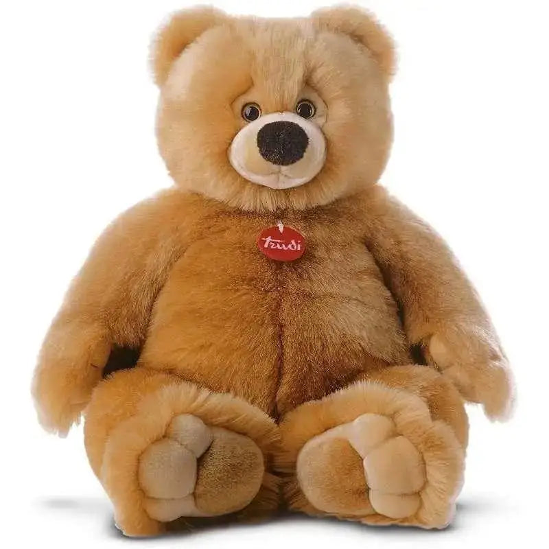 A plush light brown orso ettore peluche with soft fur and a red tuzz tag on its chest