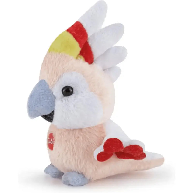A plush cockatoo toy from trudi sweet collection with peach feathers red yellow crest and heart accents on wings