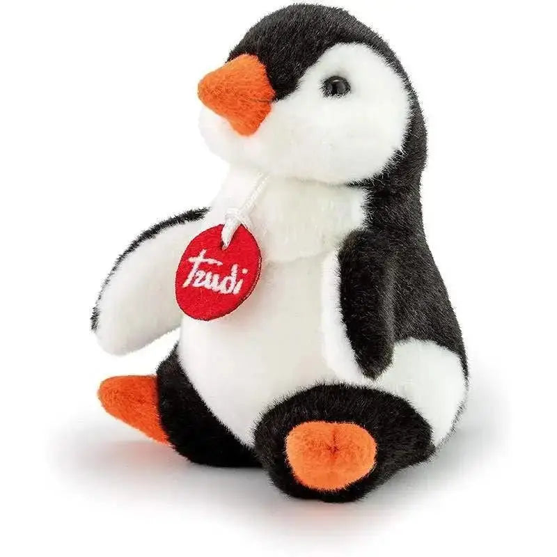 A plush trudino pinguino toy in black and white fur with orange beak and feet and a red fendi tag